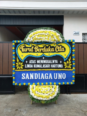 Papan Bunga Duka di Muting